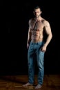 Man posing in jeans