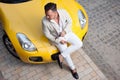 Man posing with sport car Royalty Free Stock Photo