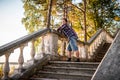 Man posing on stairs n forest Royalty Free Stock Photo