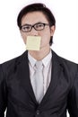 Man with post it on his mouth Royalty Free Stock Photo