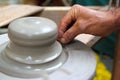 Man potter hands working on pottery clay wheel Royalty Free Stock Photo