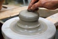 Man potter hands working on pottery clay wheel Royalty Free Stock Photo