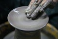 Man potter making ceramic pot on the pottery wheel Royalty Free Stock Photo