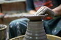 Man potter making ceramic pot on the pottery wheel Royalty Free Stock Photo