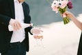 Man is pouring champagne in two glasses to celebrate the engagement Royalty Free Stock Photo