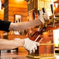 Man pouring, filling beer glass, mug Royalty Free Stock Photo