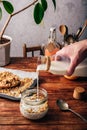 Man pouring milk on cereals Royalty Free Stock Photo