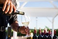 Man pouring white wine Royalty Free Stock Photo