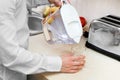 Man pours filtered water