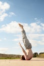 Man practices asanas on yoga in harmony with nature