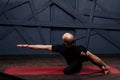 Man practicing advanced yoga against a urban background Royalty Free Stock Photo