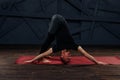 Man practicing advanced yoga against a urban background Royalty Free Stock Photo