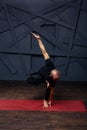 Man practicing advanced yoga against a urban background Royalty Free Stock Photo
