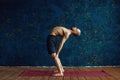 Man practicing advanced yoga. A series of yoga poses. Sport concept Royalty Free Stock Photo