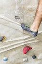 Man practicing rock climbing on artificial wall indoors. Active Royalty Free Stock Photo