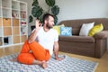 Man practicing yoga and meditation at home. A series of yoga poses. Lifestyle concept Royalty Free Stock Photo