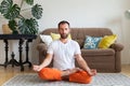 Man practicing yoga and meditation at home. A series of yoga poses. Lifestyle concept Royalty Free Stock Photo