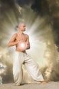 Man Practises Tai Chi holding a Ball of Energy Royalty Free Stock Photo