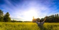 Man praising in field Royalty Free Stock Photo