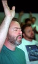 Man in prayer and praise at a Christian retreat Royalty Free Stock Photo