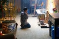 Man praying at Buddhist temple in Ho Chi Minh City Royalty Free Stock Photo
