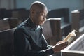 Man praying in church Royalty Free Stock Photo