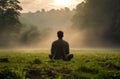 Man Praying on Field