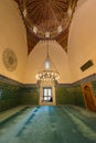 Man praying at the Green Mosque Yesil Cami in Bursa, Turkey