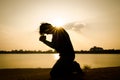 Man praying in the morning.