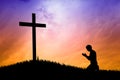 Man praying under the cross Royalty Free Stock Photo