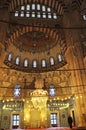 Man prays in Edirne Selimiye Mosque in Turkey. The mosque was commissioned by Sultan Selim II, and was built by architect Mimar Si Royalty Free Stock Photo