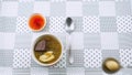 Man prepare chinese style food Fish Maw Soup with quail egg, chicken meat, and curdled blood of fowls.