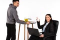 A man prepares coffee at home for a woman while she work at a laptop in online conference. Gender stereotypes