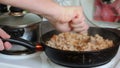 A man prepares dinner.