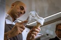 Man prepares an ice cream cone at Golosaria 2013 in Milan, Italy