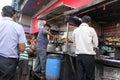 Man prepares simple street food in Kolkata