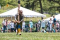 Man Prepares To Perform Caber Toss At Scottish Highland Games