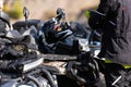 A man is preparing for an adventurous ride on a quad bike