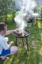 Man preparing barbecue Royalty Free Stock Photo