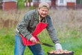 Man preparing barbecue Royalty Free Stock Photo