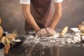 Man preparing buns at table in bakery Royalty Free Stock Photo