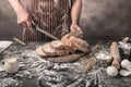 Man preparing buns at table in bakery Royalty Free Stock Photo