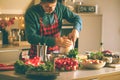 Man preparing delicious and healthy food in the home kitchen for christmas Christmas Duck or Goose Royalty Free Stock Photo