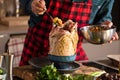 Man preparing delicious and healthy food in the home kitchen for christmas Christmas Duck or Goose Royalty Free Stock Photo