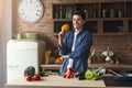 Man preparing delicious and healthy food in the home kitchen Royalty Free Stock Photo