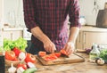 Man preparing delicious and healthy food in the home kitchen Royalty Free Stock Photo