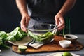 Man preparing detox salad romaine lettuce Healthy food