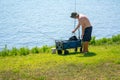 Man Preparing Fishing Equipment