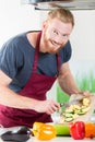 Man preparing food for cooking in kitchen Royalty Free Stock Photo