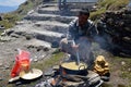 A man preparing halwa puri Royalty Free Stock Photo